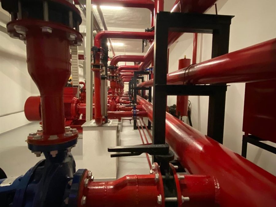 Red fire-main pipework and valves