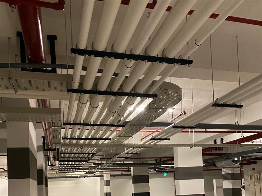 Drainage and water-supply pipework in a basement